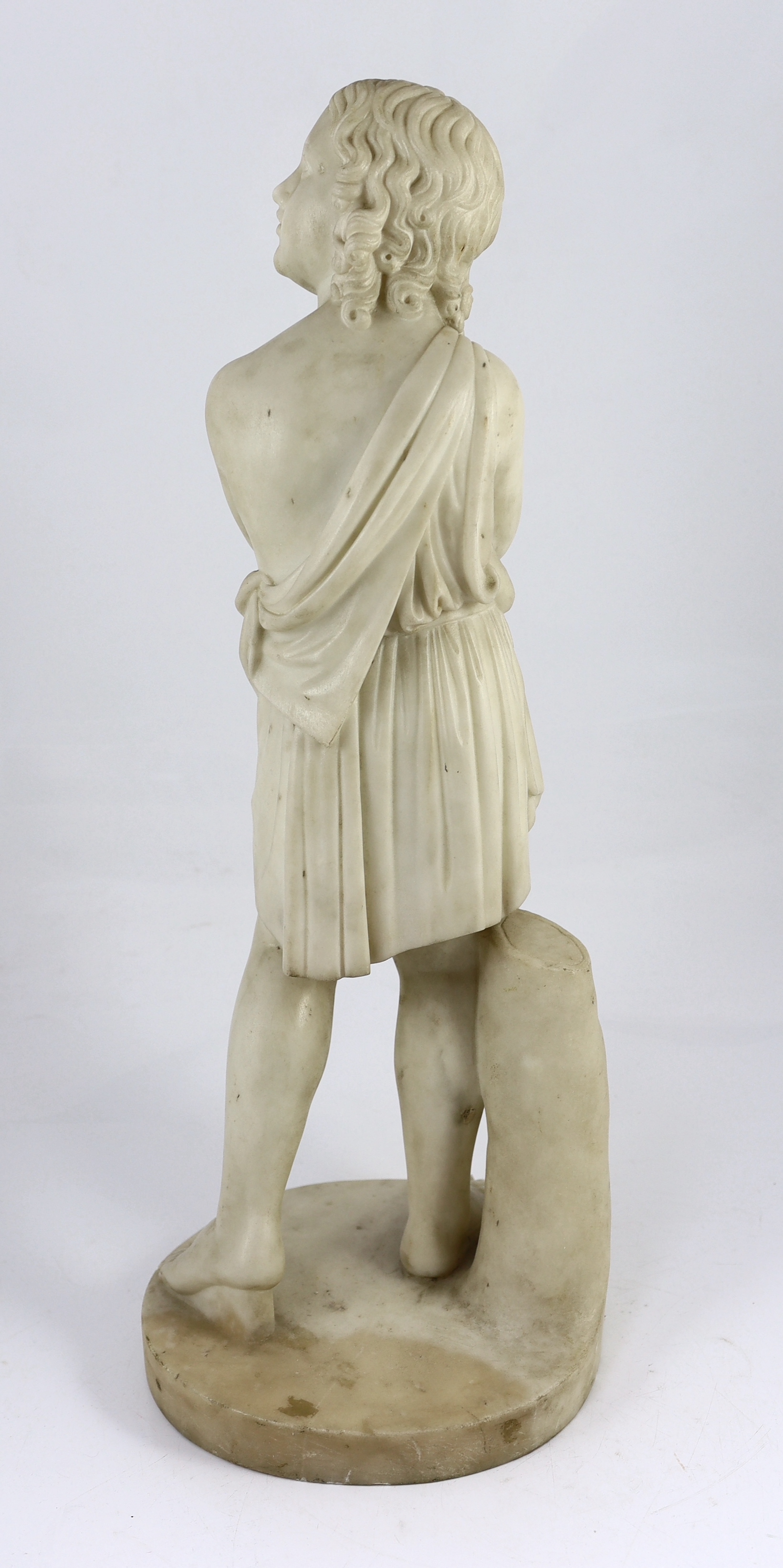 Manner of Luigi Bienaimé (Italian, 1795-1878). An Italian carved white marble figure of a youth wearing a toga, 59cm high